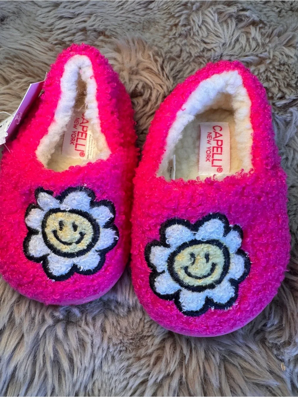 Capelli of New York Hot Pink Fuzzy Slippers with Smiley Daisy